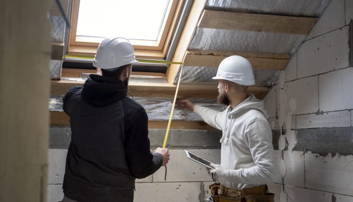 medium-shot-people-working-with-helmets